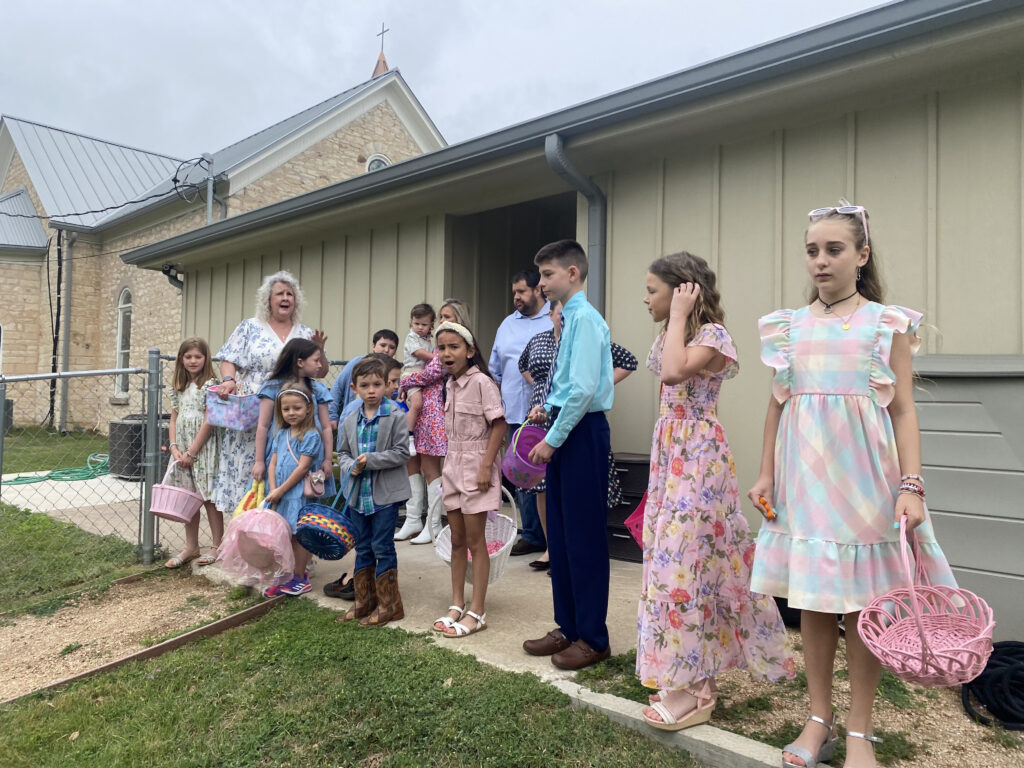 Children gathering for Easter egg hunt