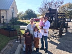 Photo of family in settler costumes